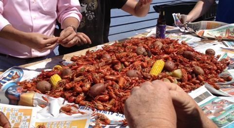 Crawfish boil outside the Fair Grounds